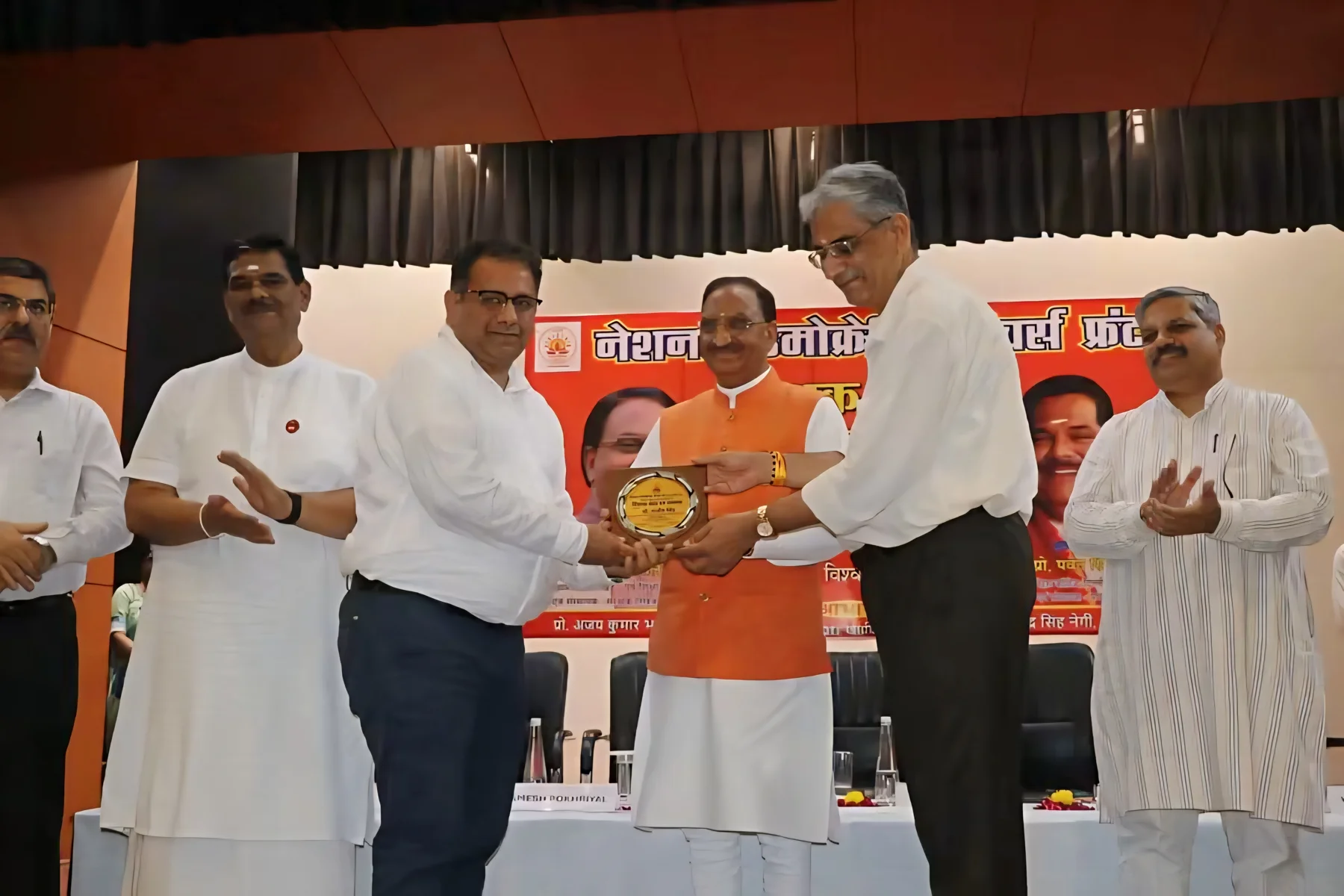 Receiving a memento of honour at a national science felicitation ceremony